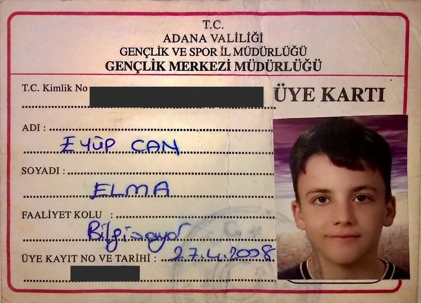 my childhood membership card for the computer club at adana youth centre, dated 2008; identifying numbers redacted