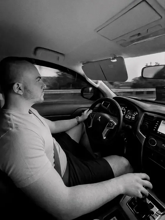A monochrome portrait in transit
